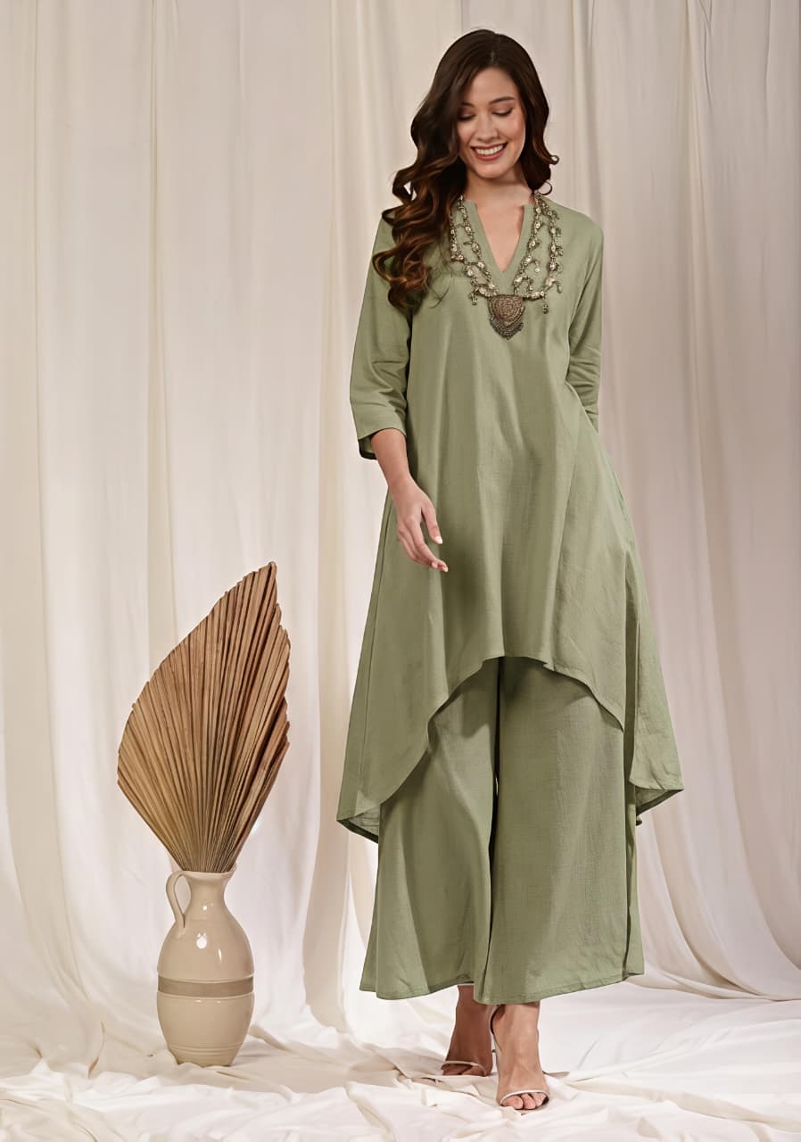 Pista Green Asymmetric Cotton Kurta Paired with Pants