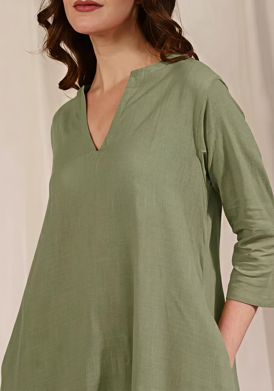 Pista Green Asymmetric Cotton Kurta Paired with Pants