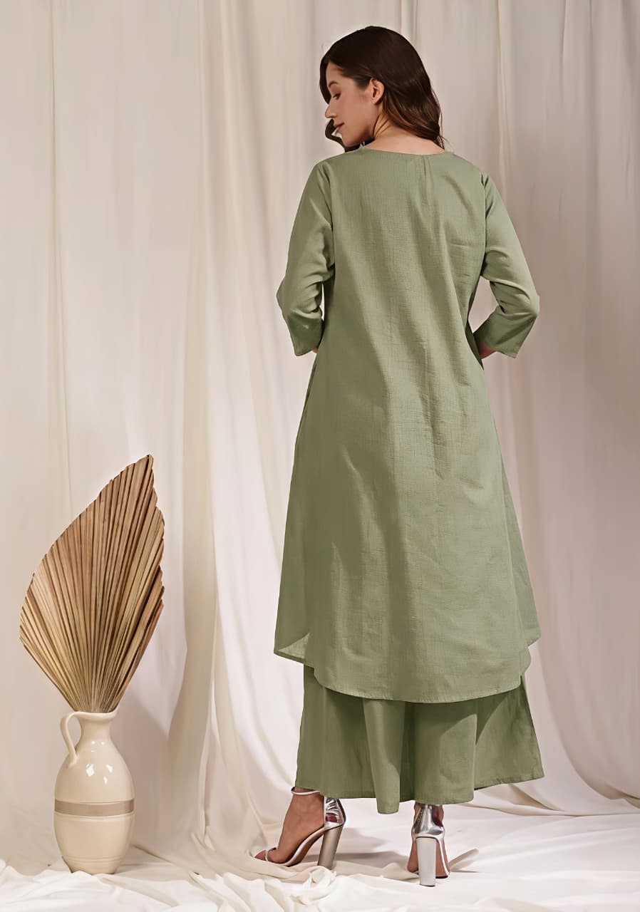 Pista Green Asymmetric Cotton Kurta Paired with Pants