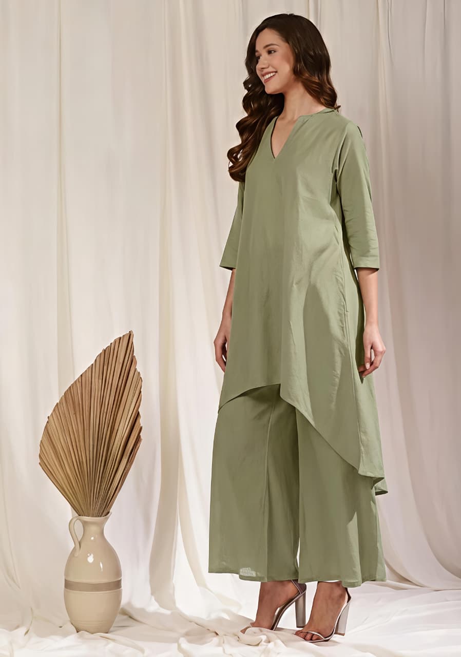 Pista Green Asymmetric Cotton Kurta Paired with Pants