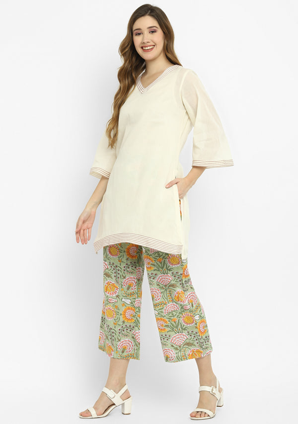 Ivory Mulmul Kurta With Contrast Stitch Lines Paired with Colourful Hand Block Printed Pants/Slip