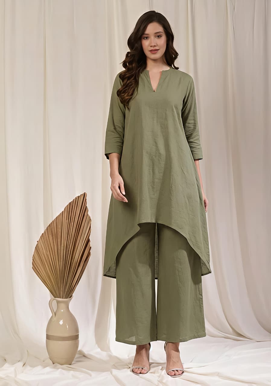 Pista Green Asymmetric Cotton Kurta Paired with Pants