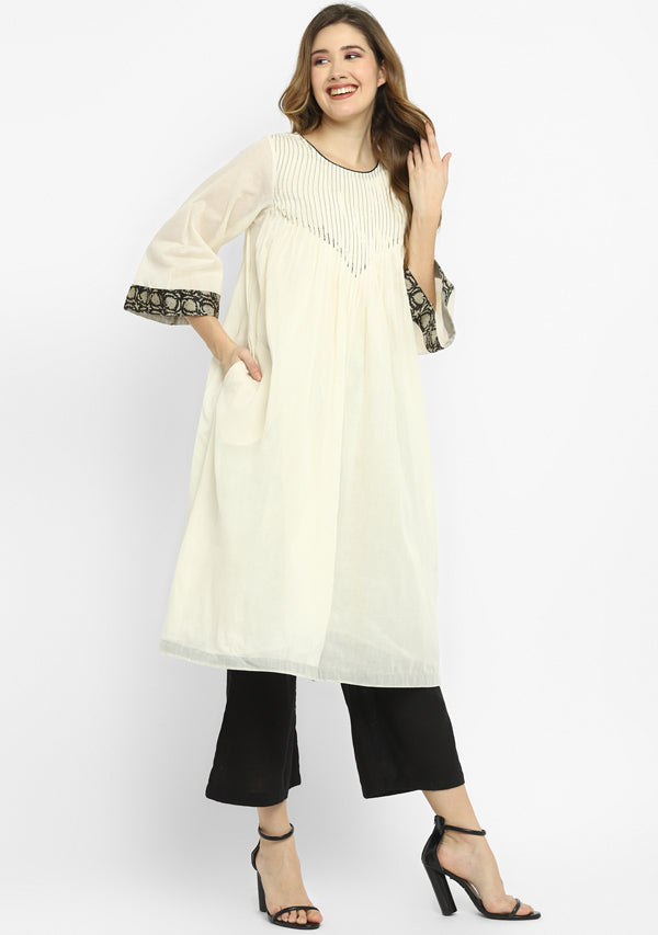 Ivory Mulmul A-Line Kurta Dress With Black Pintucks Paired with Cotton Pants/Slip
